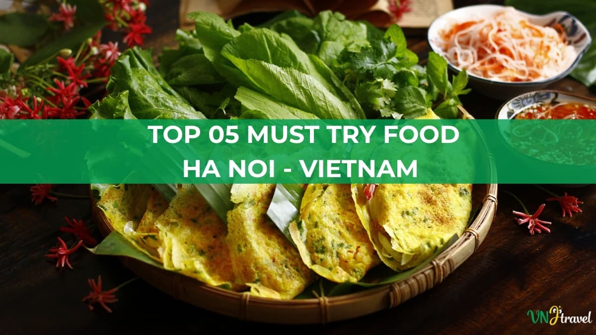 A golden, folded bánh xèo served in a woven basket, surrounded by fresh lettuce, herbs, vegetables, and dipping sauces. A translucent green banner across the center reads “TOP 05 food guide cover featuring Vietnamese bánh xèo with fresh herbs and dipping sauces, with the title “TOP 05 MUST TRY FOOD HA NOI - VIETNAM” in white text on a green banner.