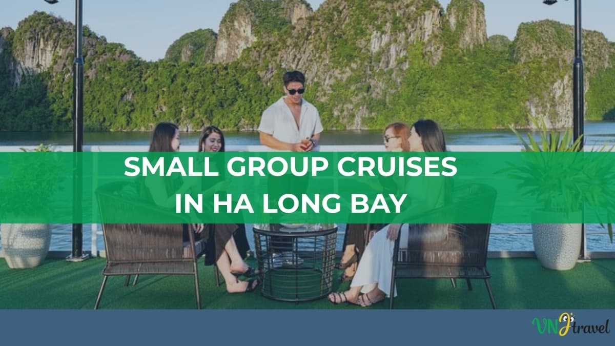 A group of young people relaxing and chatting on the open deck of a cruise ship in Ha Long Bay,