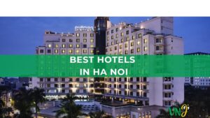 An exterior evening view of the Pullman Hanoi hotel, overlaid with a green banner reading "BEST HOTELS IN HA NOI" and a VNI travel logo at the bottom right.