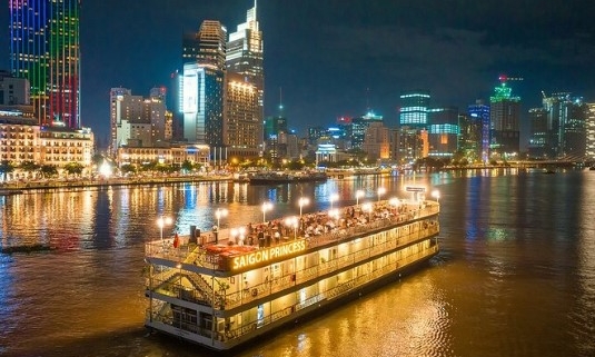 Saigon River cruise at night with city skyline
