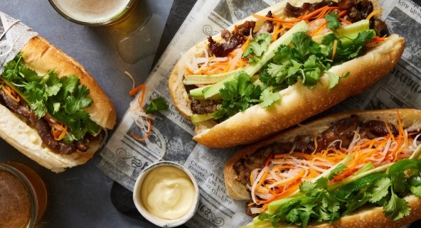 Vietnamese banh mi sandwich with chicken and vegetables, a kid-friendly street food option