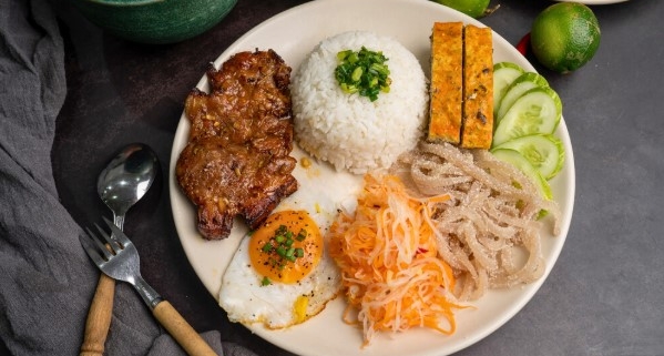 Vietnamese broken rice with grilled meat (com tam), a kid-friendly Vietnamese meal