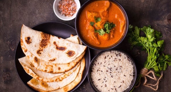 Indian food options in Vietnam such as naan, curry and rice