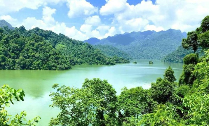 Panoramic view of Ba Be Lake surrounded by mountains and forests in Northern Vietnam