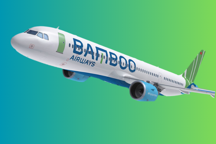 A Bamboo Airways passenger airplane flying against a blue and green gradient background