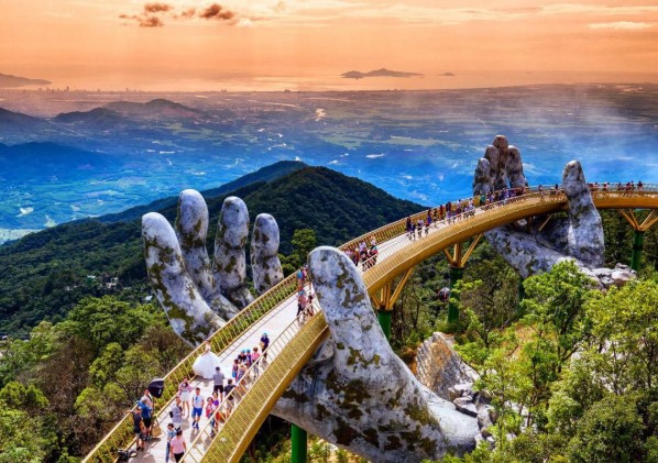 Golden Bridge held by giant hands at Sun World Ba Na Hills Da Nang