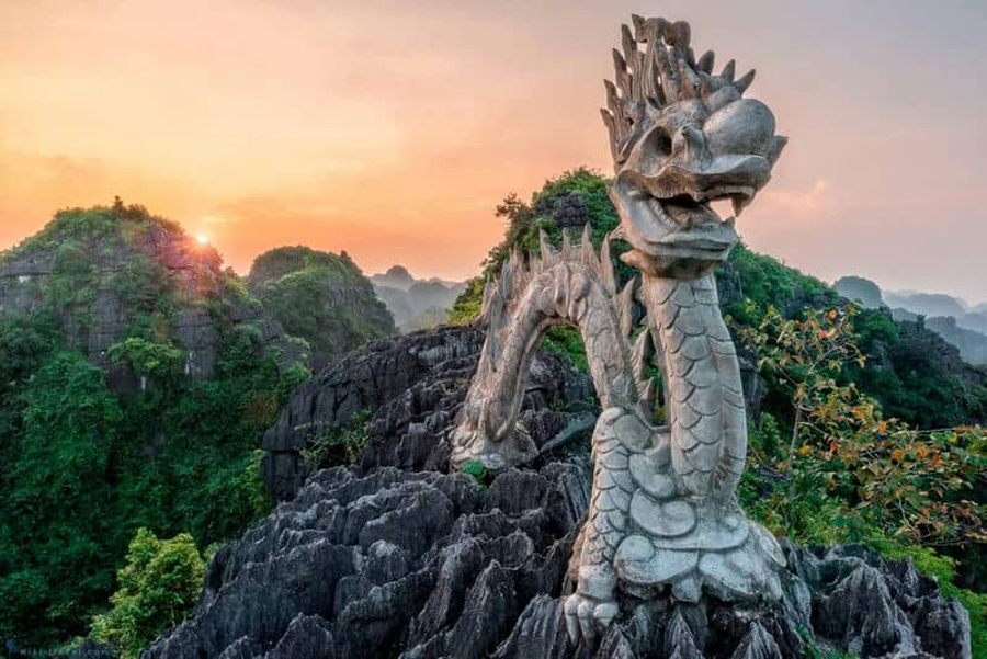 Ngoa Long Mountain overlooking the rice fields and limestone mountains in Ninh Binh, Vietnam.