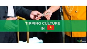 A traveler leaving a tip at a restaurant in Vietnam as a gesture of appreciation for good service.