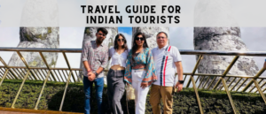 A group of Indian tourists posing on the Golden Bridge in Da Nang, Vietnam