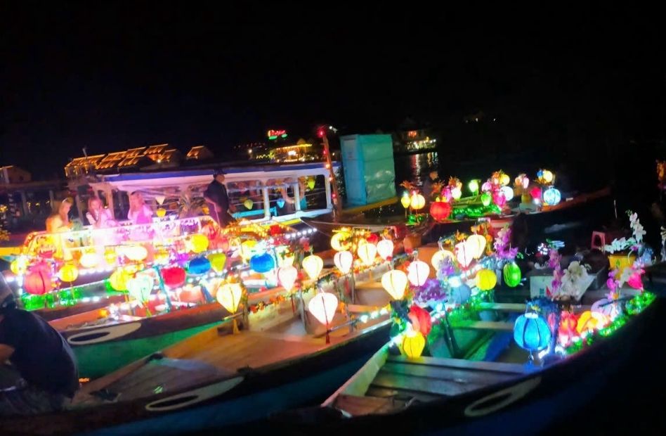 Lantern-releasing boat on the Hoai River in Hoi An at night