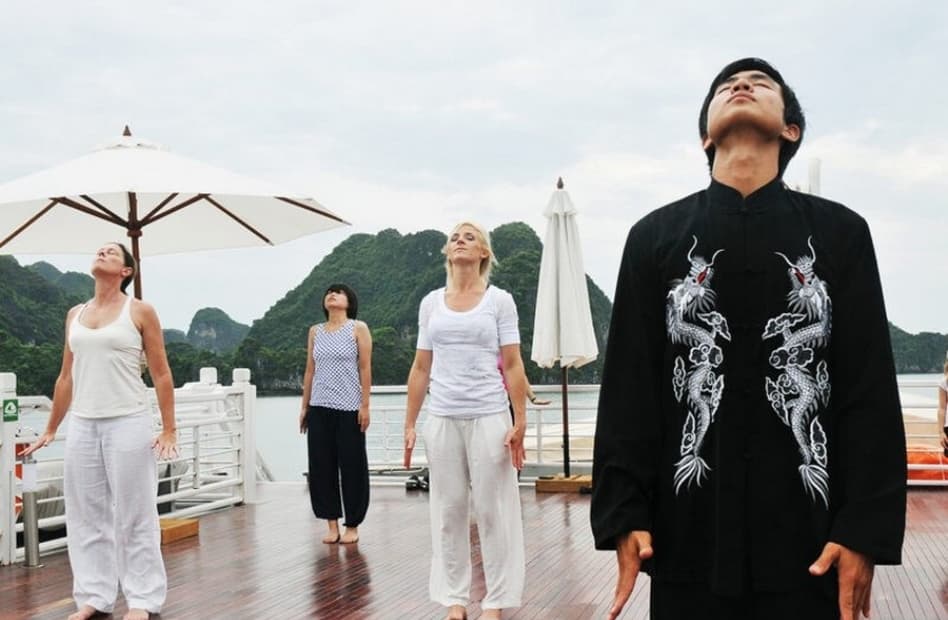 Tai Chi class on the sundeck of Catherine Cruise in Ha Long Bay